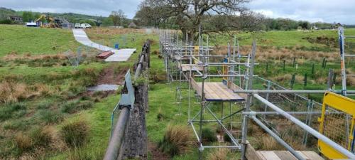 Original pipe bridge with scaffold supports for bypass pipe